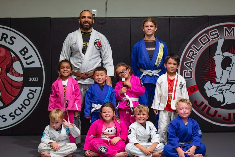 The full kids class gathered for a group photo